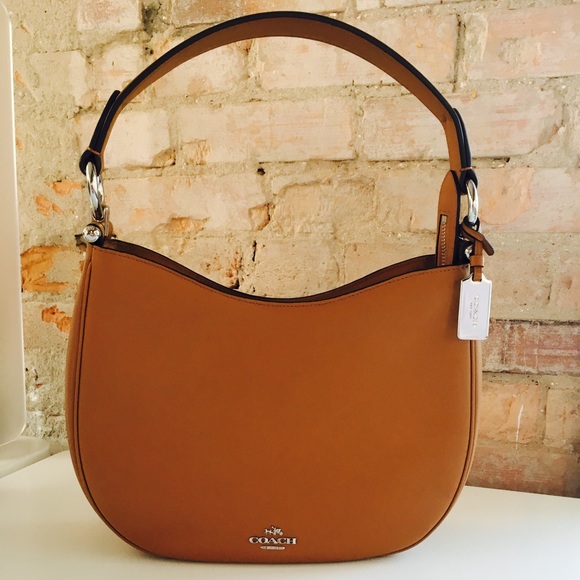 Coach Handbags - COACH Nomad Hobo in Light Saddle + Leather Cleaner